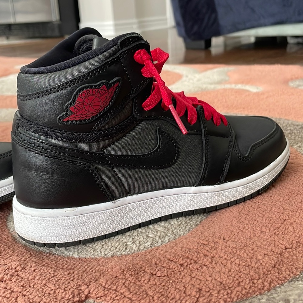 Jordan 1s Highs. Red laces black shoe. Reflective!